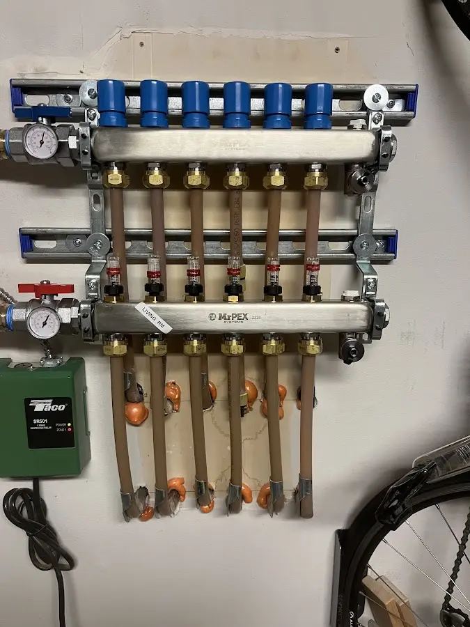 Plumber performing Water Heater Repair at a residential property in Plantation